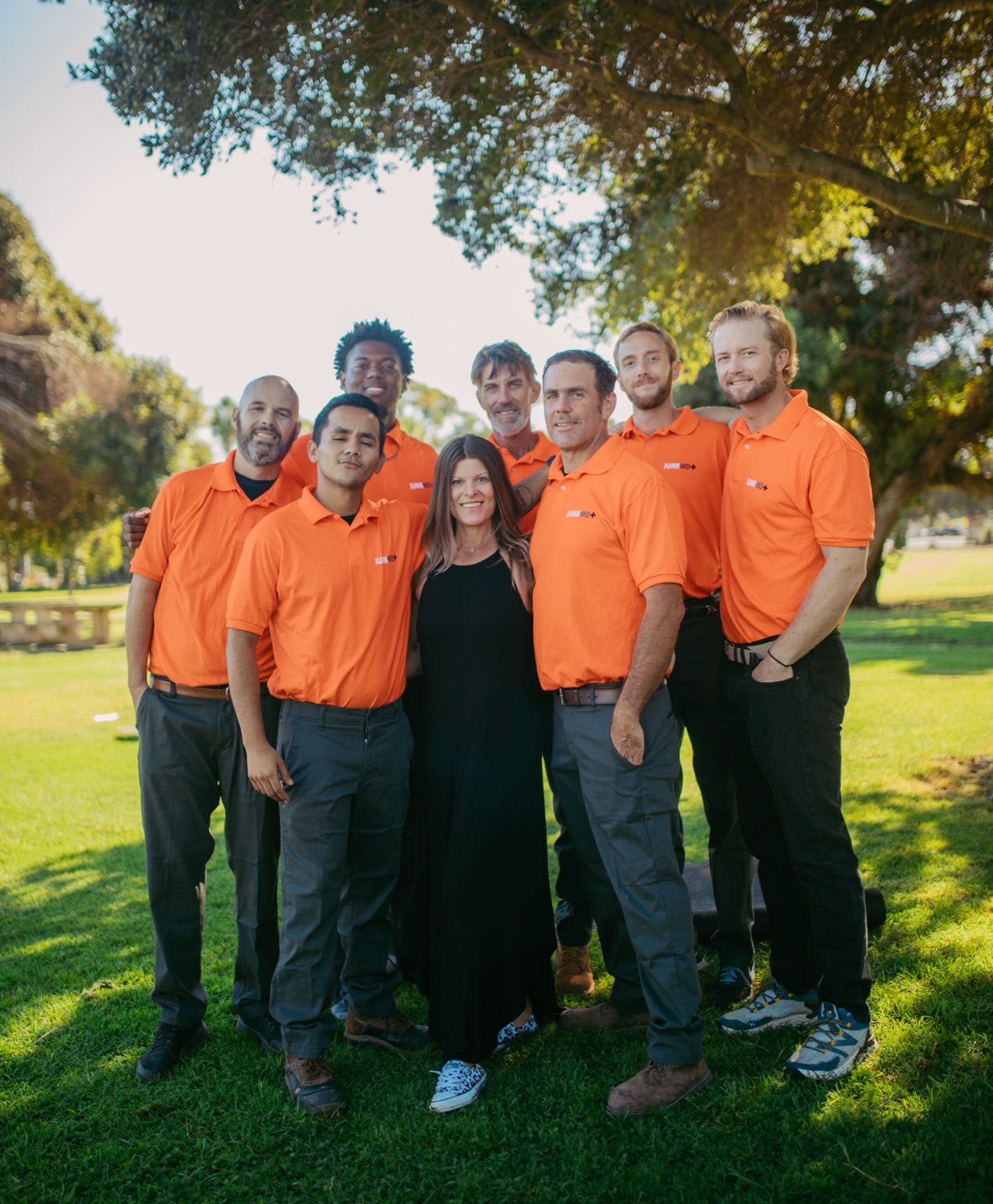 JunkMD+ owners Clemencia Sandoval and David Leddick with the San Diego crew in a park