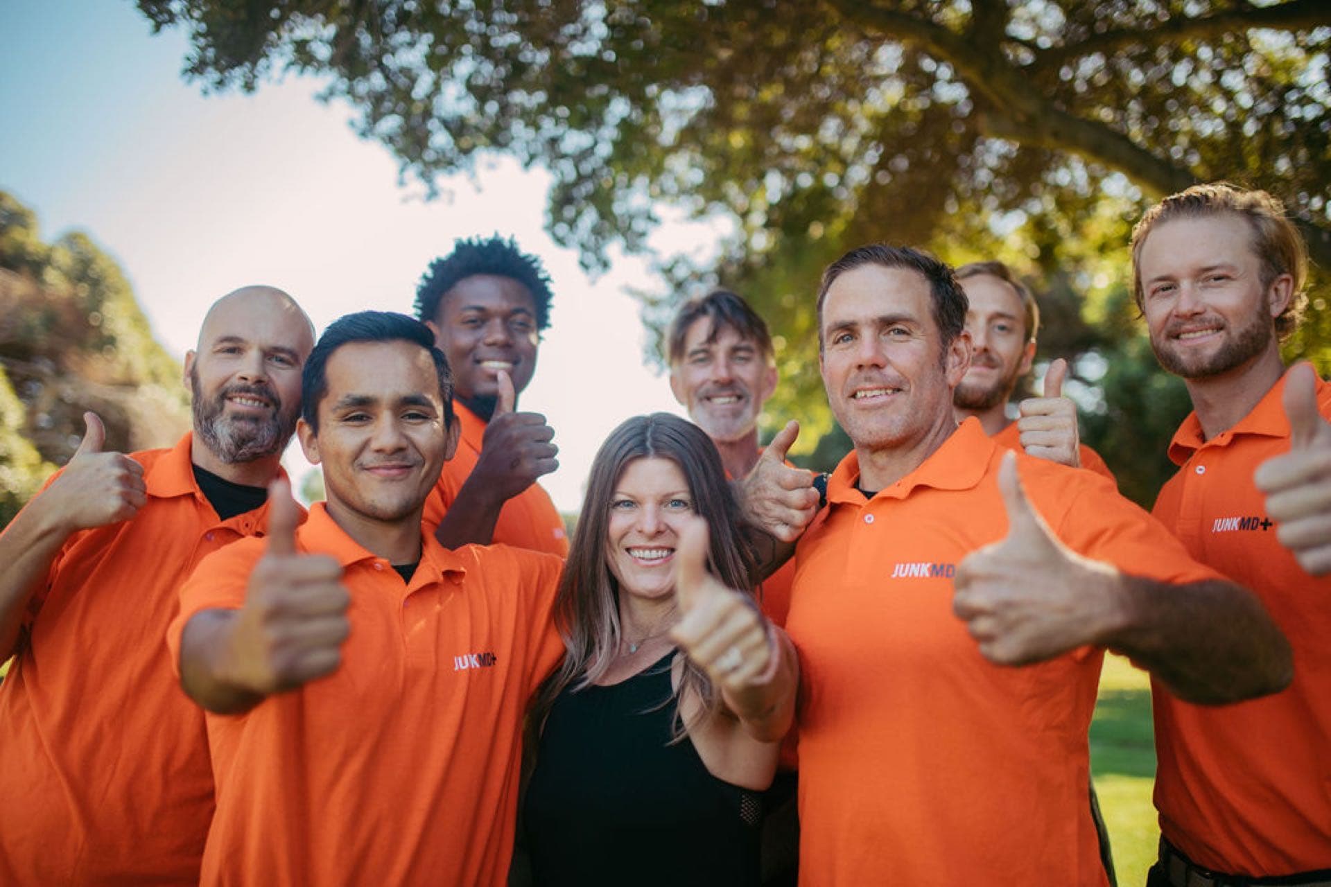 JunkMD+ crew giving a thumbs-up after a successful San Diego junk-removal house call